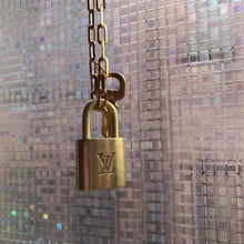 Load and play video in Gallery viewer, Reworked Authentic Vintage LV Lock Pendant